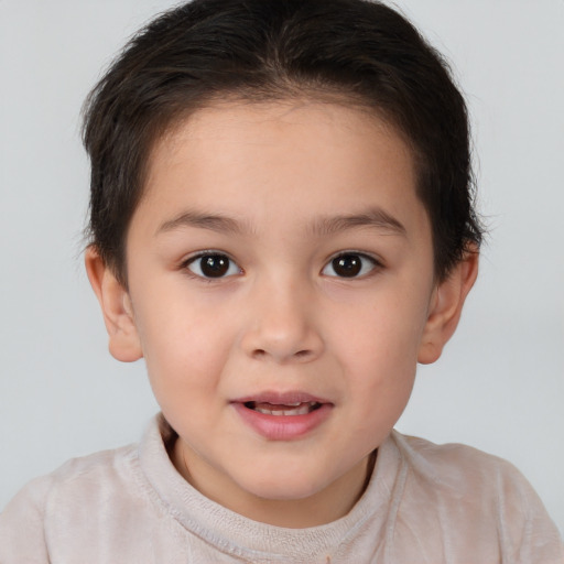 Joyful white child female with short  brown hair and brown eyes