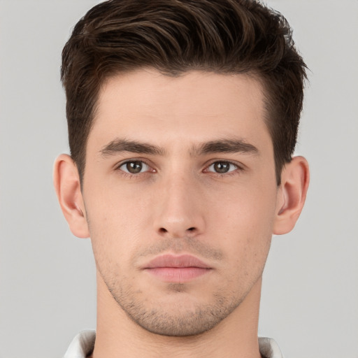 Neutral white young-adult male with short  brown hair and brown eyes