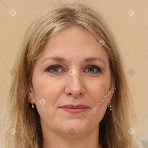 Joyful white adult female with long  brown hair and brown eyes