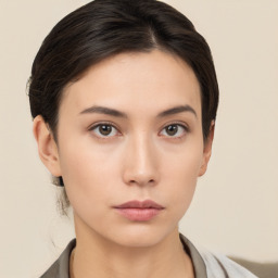 Neutral asian young-adult female with short  brown hair and brown eyes