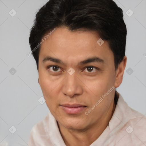 Joyful latino young-adult male with short  brown hair and brown eyes