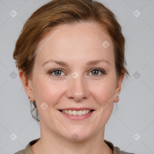 Joyful white young-adult female with medium  brown hair and blue eyes