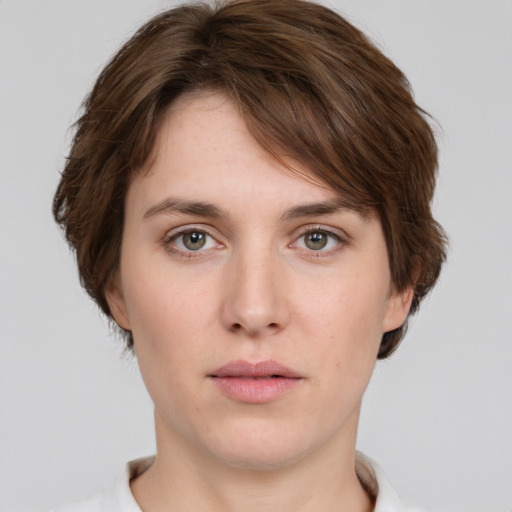 Neutral white young-adult female with short  brown hair and grey eyes