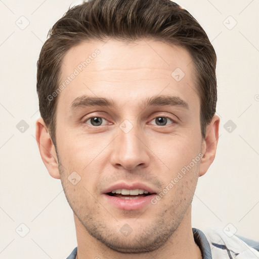 Joyful white young-adult male with short  brown hair and brown eyes