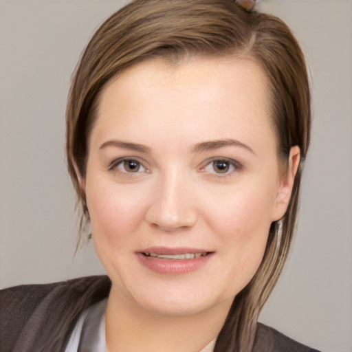 Joyful white young-adult female with medium  brown hair and brown eyes