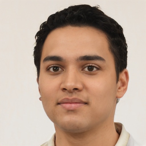 Neutral latino young-adult male with short  black hair and brown eyes