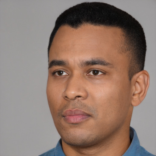 Neutral black young-adult male with short  black hair and brown eyes