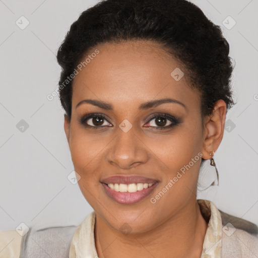 Joyful black young-adult female with short  brown hair and brown eyes