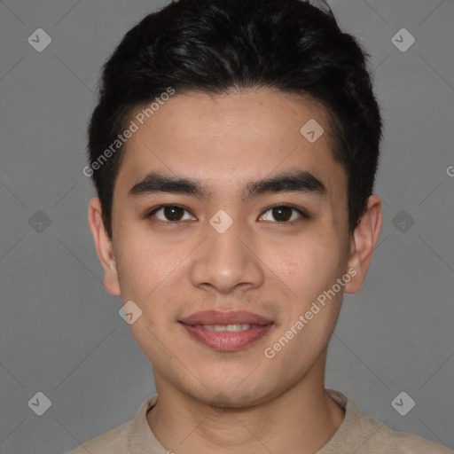 Joyful latino young-adult male with short  brown hair and brown eyes