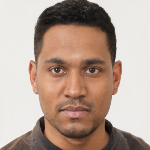 Neutral latino young-adult male with short  black hair and brown eyes