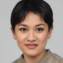 Joyful asian young-adult female with short  black hair and brown eyes