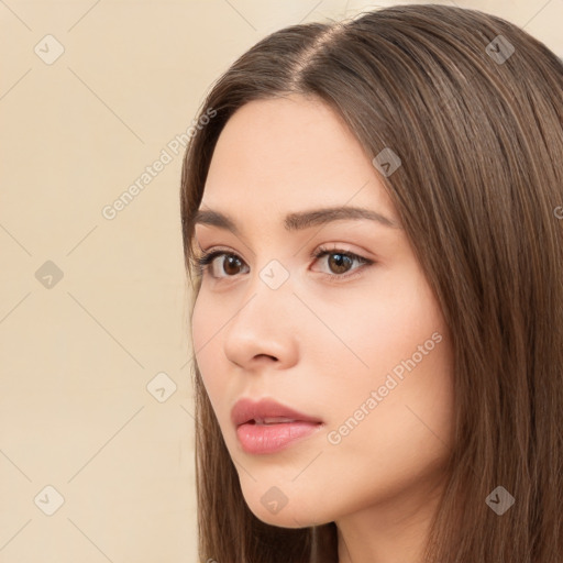 Neutral white young-adult female with long  brown hair and brown eyes