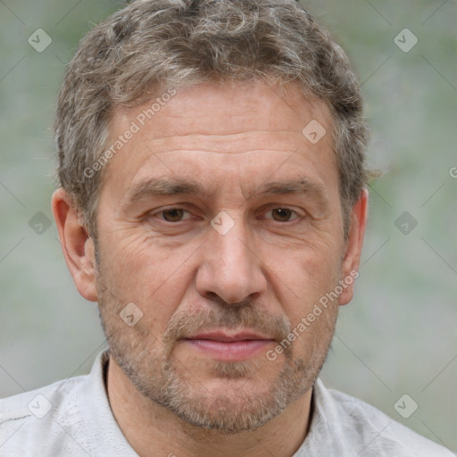 Joyful white middle-aged male with short  brown hair and brown eyes