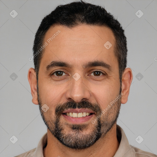 Joyful white adult male with short  black hair and brown eyes