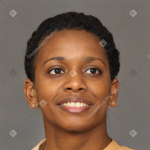 Joyful black young-adult female with short  brown hair and brown eyes