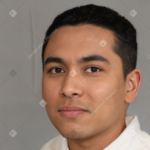 Joyful white young-adult male with short  black hair and brown eyes