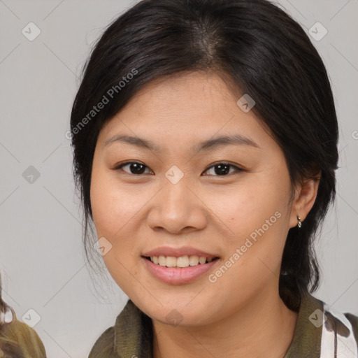 Joyful asian young-adult female with medium  brown hair and brown eyes