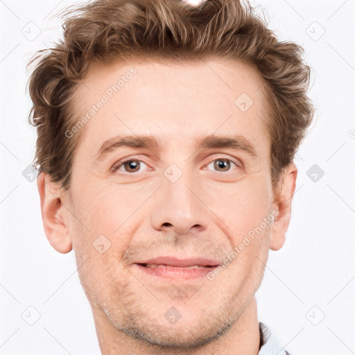 Joyful white adult male with short  brown hair and grey eyes