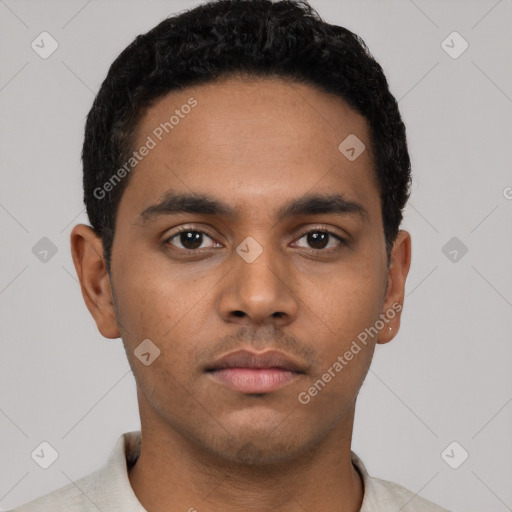 Neutral latino young-adult male with short  black hair and brown eyes