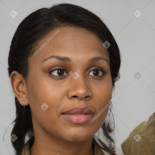 Joyful black young-adult female with long  brown hair and brown eyes