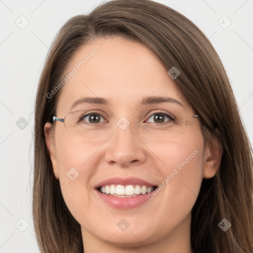 Joyful white young-adult female with long  brown hair and grey eyes