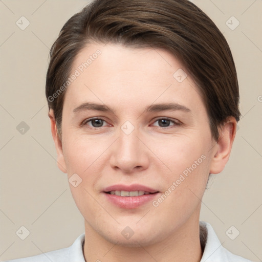 Joyful white young-adult female with short  brown hair and brown eyes