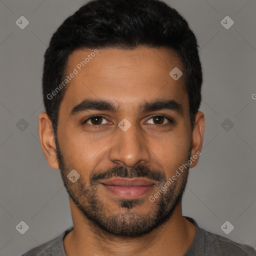 Joyful latino young-adult male with short  black hair and brown eyes