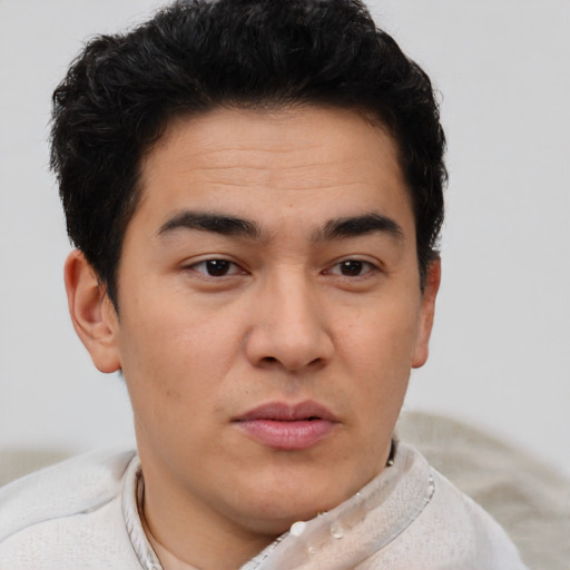 Neutral latino young-adult male with short  brown hair and brown eyes