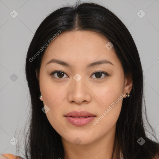 Joyful asian young-adult female with long  brown hair and brown eyes