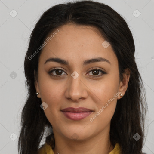 Joyful latino young-adult female with long  brown hair and brown eyes