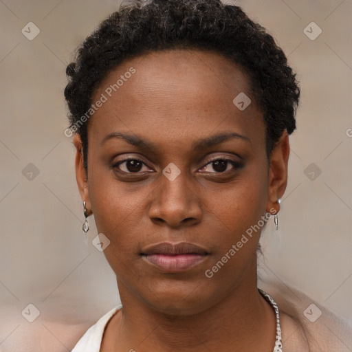 Neutral black young-adult female with short  brown hair and brown eyes