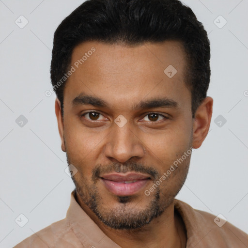 Joyful black young-adult male with short  black hair and brown eyes