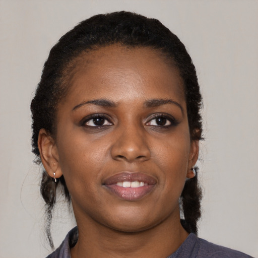 Neutral black young-adult female with medium  black hair and brown eyes