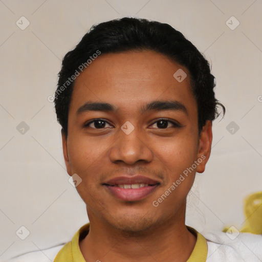 Joyful latino young-adult male with short  black hair and brown eyes