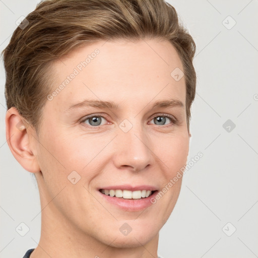 Joyful white young-adult female with short  brown hair and grey eyes