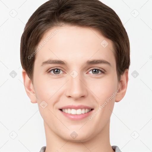 Joyful white young-adult female with short  brown hair and grey eyes