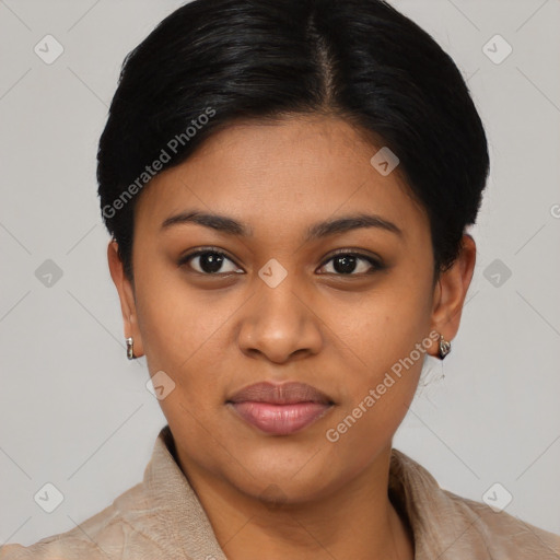Joyful latino young-adult female with short  black hair and brown eyes