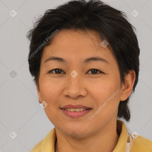 Joyful asian young-adult female with short  brown hair and brown eyes