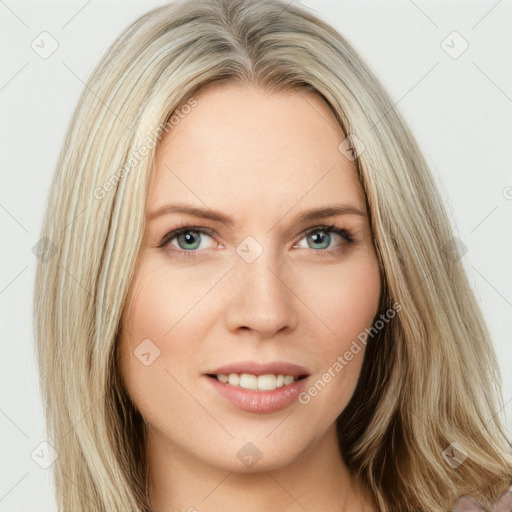 Joyful white young-adult female with long  brown hair and blue eyes