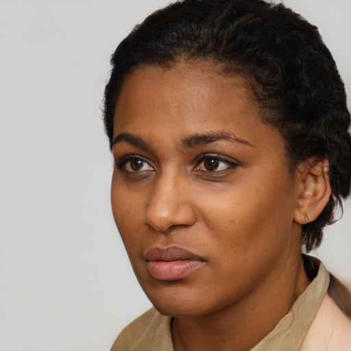 Neutral black young-adult female with short  brown hair and brown eyes