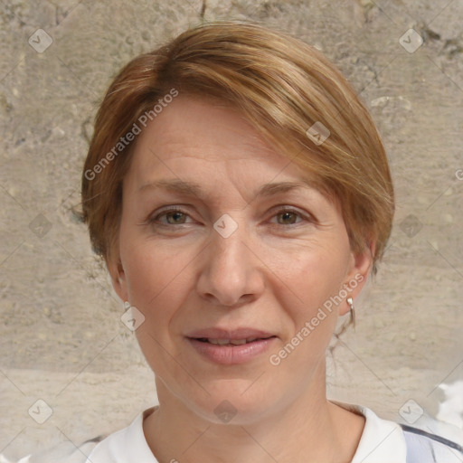 Joyful white adult female with medium  brown hair and blue eyes