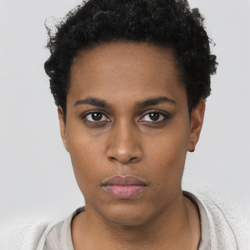Neutral black young-adult female with short  black hair and brown eyes