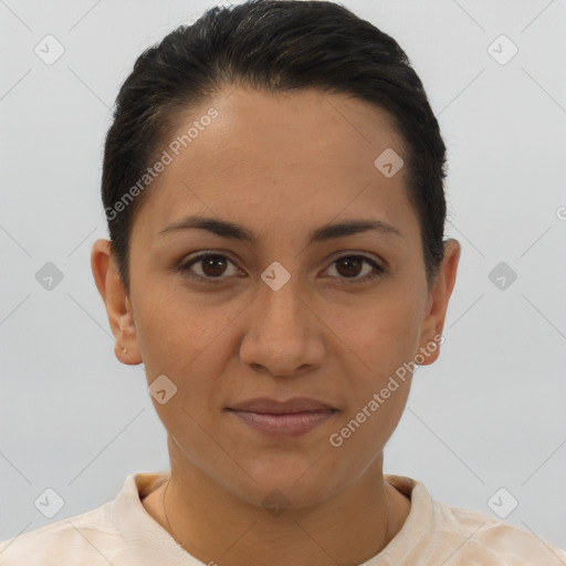 Joyful latino young-adult female with short  brown hair and brown eyes