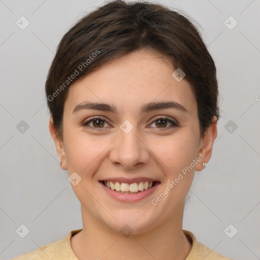 Joyful white young-adult female with short  brown hair and brown eyes