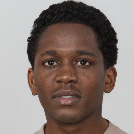 Neutral black young-adult male with short  brown hair and brown eyes