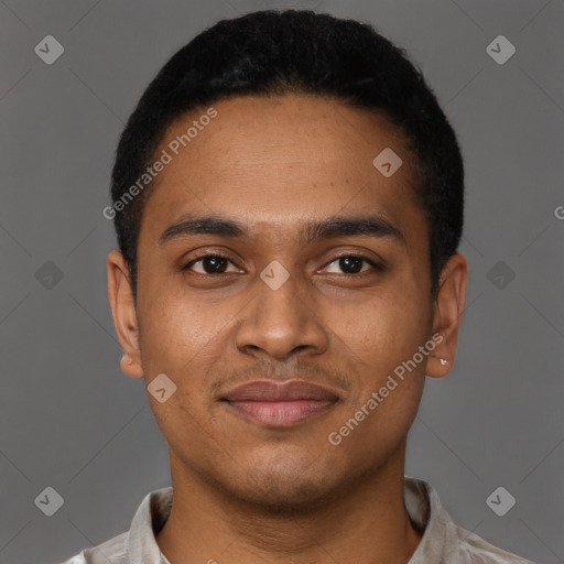 Joyful black young-adult male with short  brown hair and brown eyes