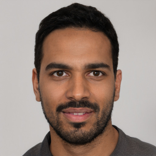 Neutral latino young-adult male with short  black hair and brown eyes