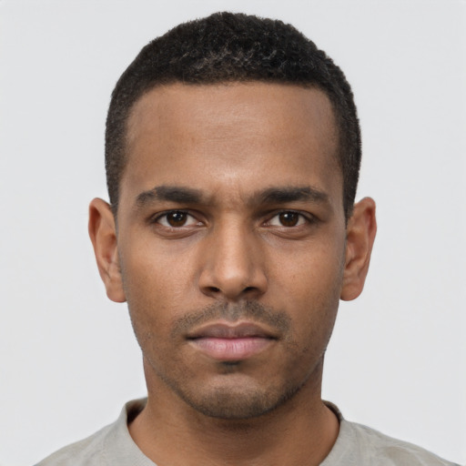 Neutral black young-adult male with short  black hair and brown eyes