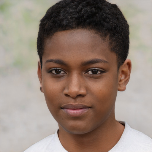 Joyful black child female with short  black hair and brown eyes