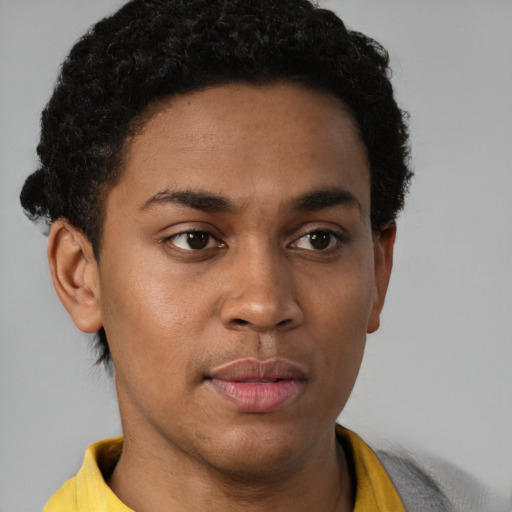 Neutral black young-adult male with short  brown hair and brown eyes